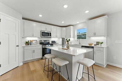 Kingston floorplan, ready Dec 2025! Photo of similar home. Colors, styles and selections will vary.