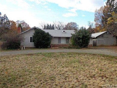 Circle driveway, large yard and work shop!