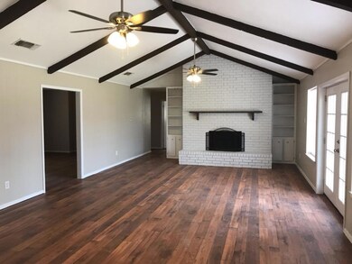 Den with fireplace