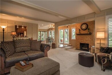 Great Room bathed in sunny views of the golf course.