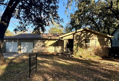 Single story home with a garage