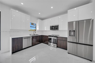 704 Holmes Ave, Lehigh Acres, FL 33974 - photo 2