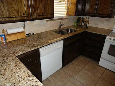 Kitchen. Granite counters and tile back splash
