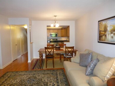Looking toward the kitchen and front door.  The fl