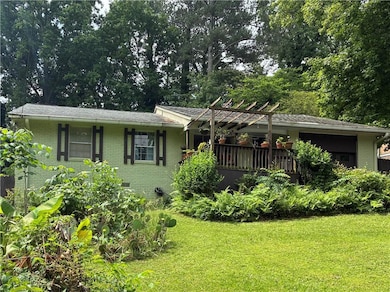 View of front of home featuring and a front yard