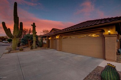 Front of Home with Huge Saguaros