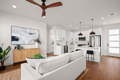 Living room with hardwood / wood-style flooring, 