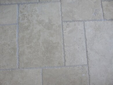 detail of front porch travertine floor