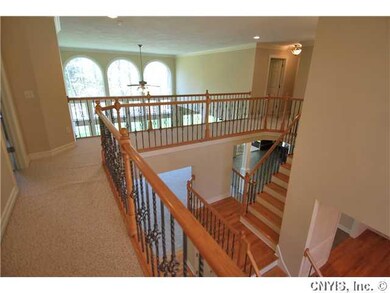 Other. Spectacular double stairway offers access t