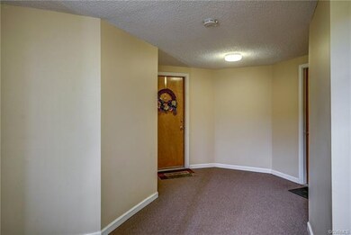 Spacious hallway leading to your front door.