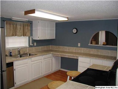 Look at this custom arched opening to the family/l