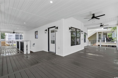 Porch featuring ceiling fan
