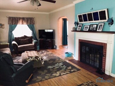 Elegant fireplace and great natural light, too!