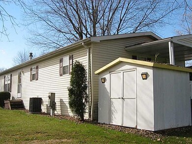 Exterior Back. Shed included on this property.