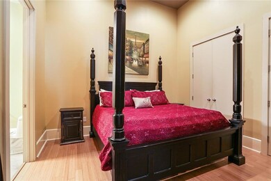 The master is en suite with two oversized closets.