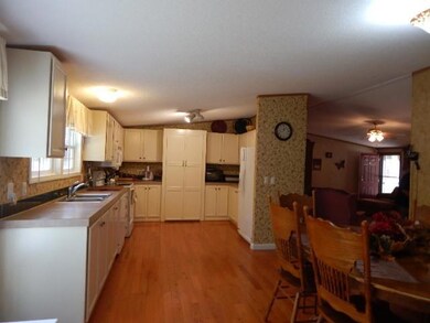 Huge kitchen with large 5 x 11 pantry. All appliances remain. 
