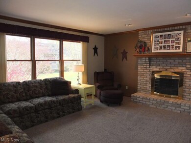 Great room with fireplace and crown​​‌​​​​‌​​‌‌​​​‌​​‌‌​​‌‌​‌​​​‌‌​​‌​​​​​‌ molding.