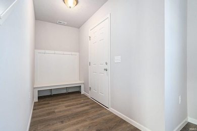 This traditional 2 story floorplan is laid out with 4 bedrooms on the second floor and several upgraded finishes.  The flooring is consistent throughout the entire first floor and there is a built-in bench for storage in the foyer.