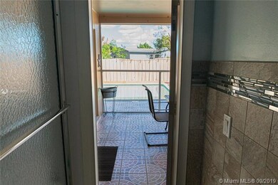 2nd bath/ cabana bath leading to screened enclosure