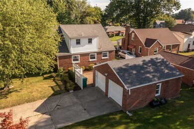 BRICK CAPE COD, BRICK 2 CAR GARAGE, CEMENT DRIVEWA