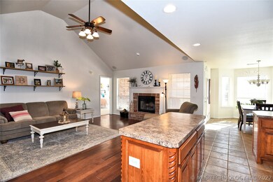 Vaulted ceilings in living room and open area has