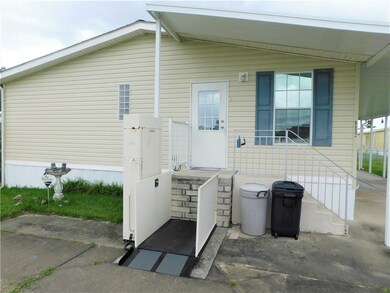 Wheel chair lift on front door.