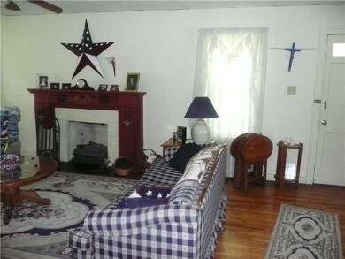 Living Room. GAS FIREPLACE...DOOR TO SIDE PORCH
