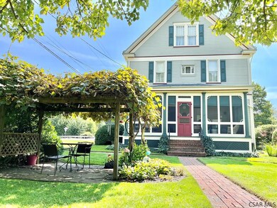 The Screened In Porch and Garden View