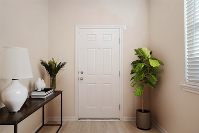 Inviting entry has plenty of space for a bench or