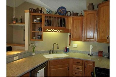 Kitchen. Oak cabinets in kitchen.  Laundry near -b