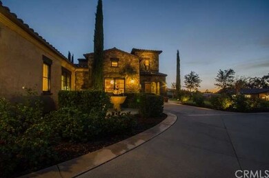 Evening view w/exterior lighting.