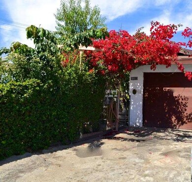 Front driveway, attached garage of unit facing Fos