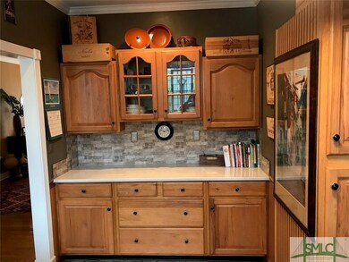 Part of kitchen showcasing the quartz counters.
