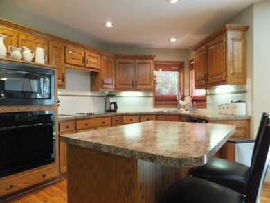 Updated appliances, counter tops & ample cabinetry