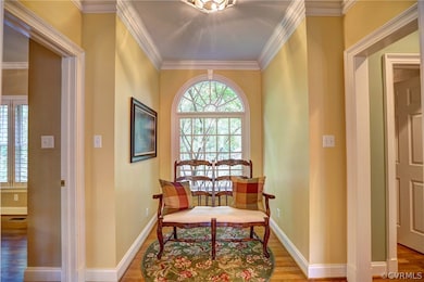 Back hallway with palladian window overlooking the