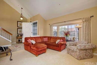 Vaulted Ceilings at the entryway make for a spacio