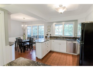 Another view of the kitchen with breakfast bar, ne