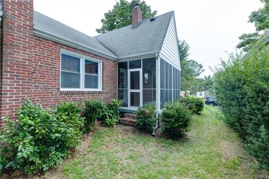 Side yard with access to side screen porch