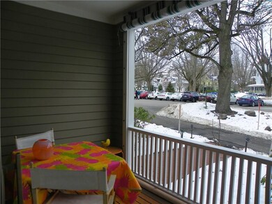 Partial view of the large covered porch with awnin