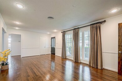 Another view of the entrance and formal living roo