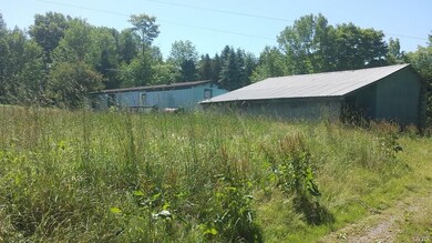 View of the rear of the 2-car garage.  Note the sh