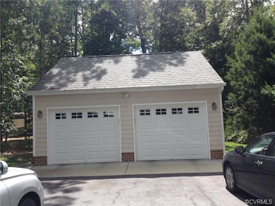 Oversized detached 2.5 car garage with pull down a