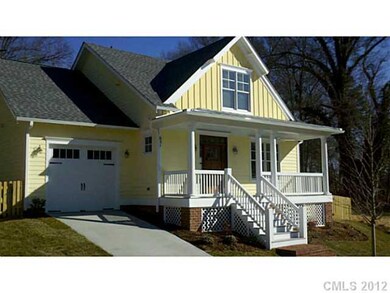 Exterior Front - House to the right of the lot.  L