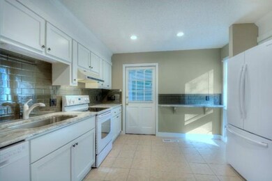 Kitchen door leads to breezeway/garage