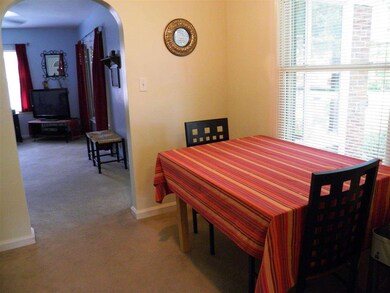 Pretty dining room has two built in corner cabinet