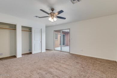 Master bedroom leading to back yard