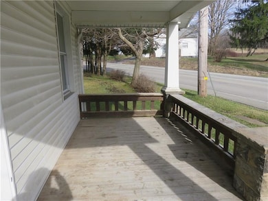 Covered front porch to enjoy those warm spring eve