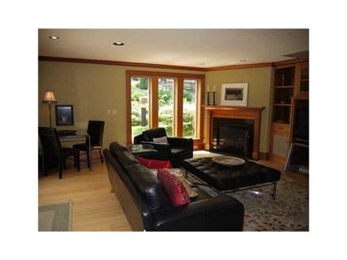 Family Room. Custom teak woodwork, 2nd fireplace, 