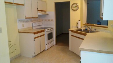 EAT IN KITCHEN: CERAMIC TILE FLOOR & DISHWASHER NEW IN 2017, GLASS TOP STOVE, DOORS TO POOL AREA, PASS OUT TO DINING/LIVING ROOM, LARGE CLOSET PANTRY 79X16, ICE MAKER LINE FOR FRIG