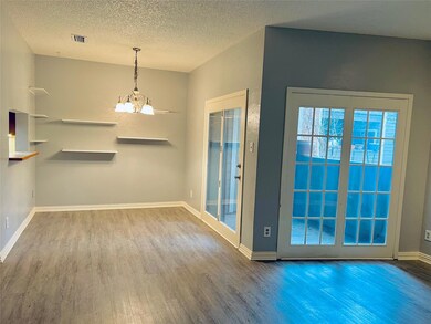 Open dining area adjacent to patio.